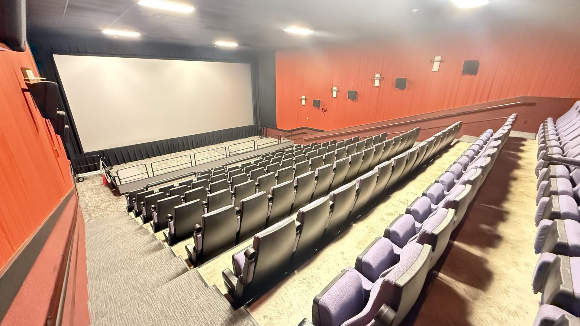 The Screenhouse auditorium, rows angled toward the 35-foot screen